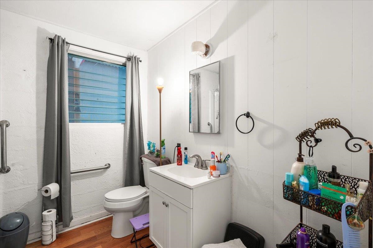 2226 Lilikoi Road Haiku, HI 96708 - Photo 23 of 50 a bathroom with a sink mirror vanity and toilet