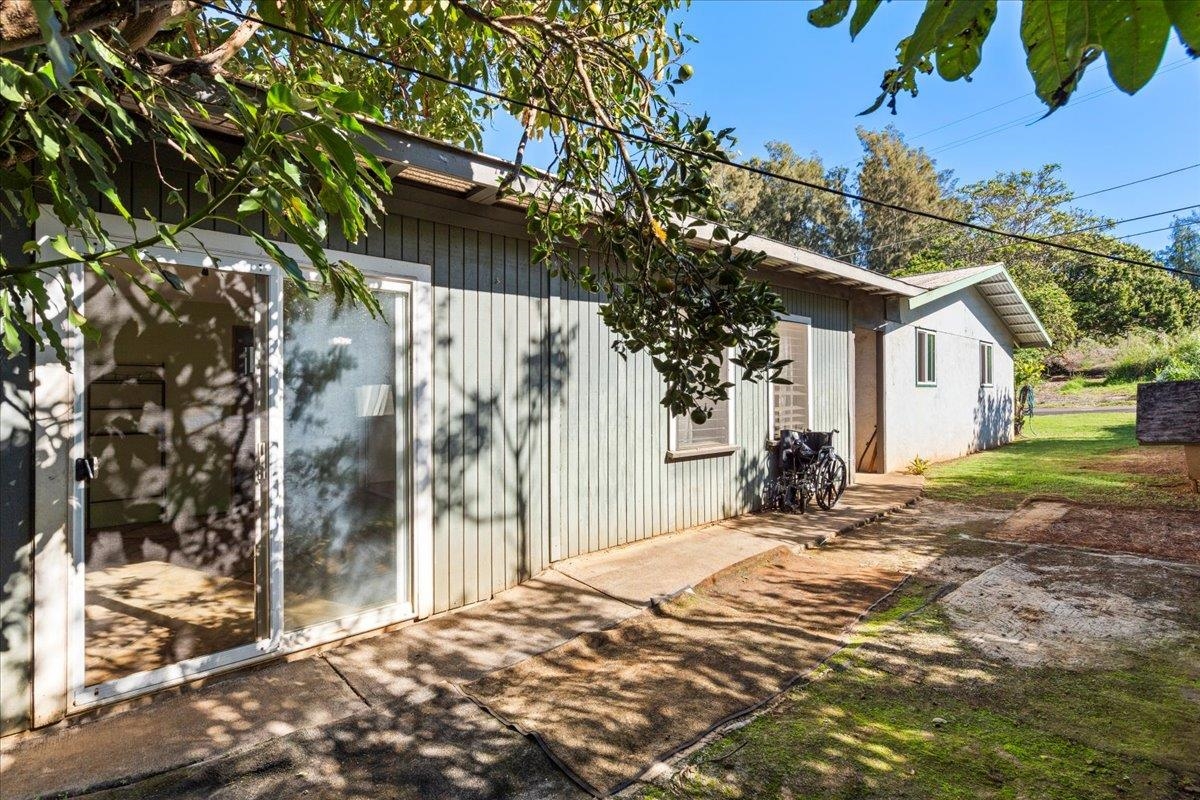 2226 Lilikoi Road Haiku, HI 96708 - Photo 33 of 50 a view of a house with a yard