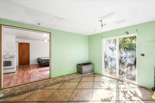 a view of an empty room and window