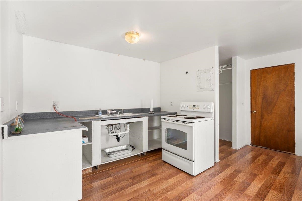 2226 Lilikoi Road Haiku, HI 96708 - Photo 37 of 50 a kitchen with a stove and a microwave