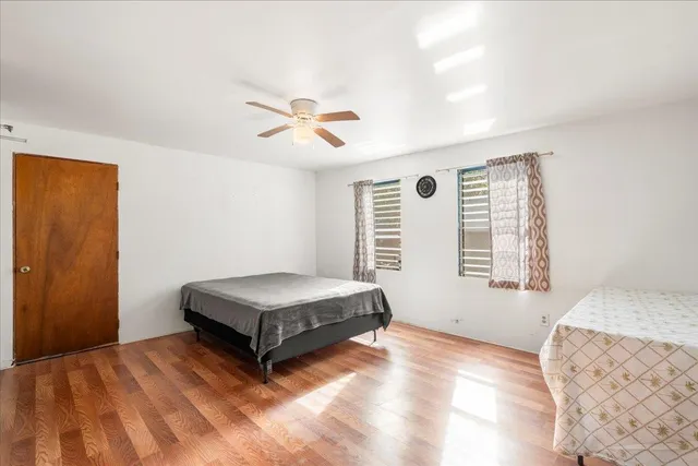 a bathroom with a shower and a sink