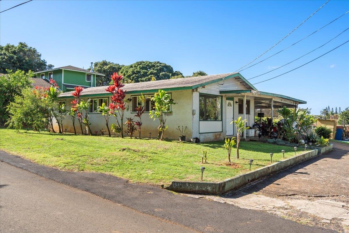 2226 Lilikoi Road Haiku, HI 96708 - Photo 5 of 50 a view of a house with backyard and sitting area
