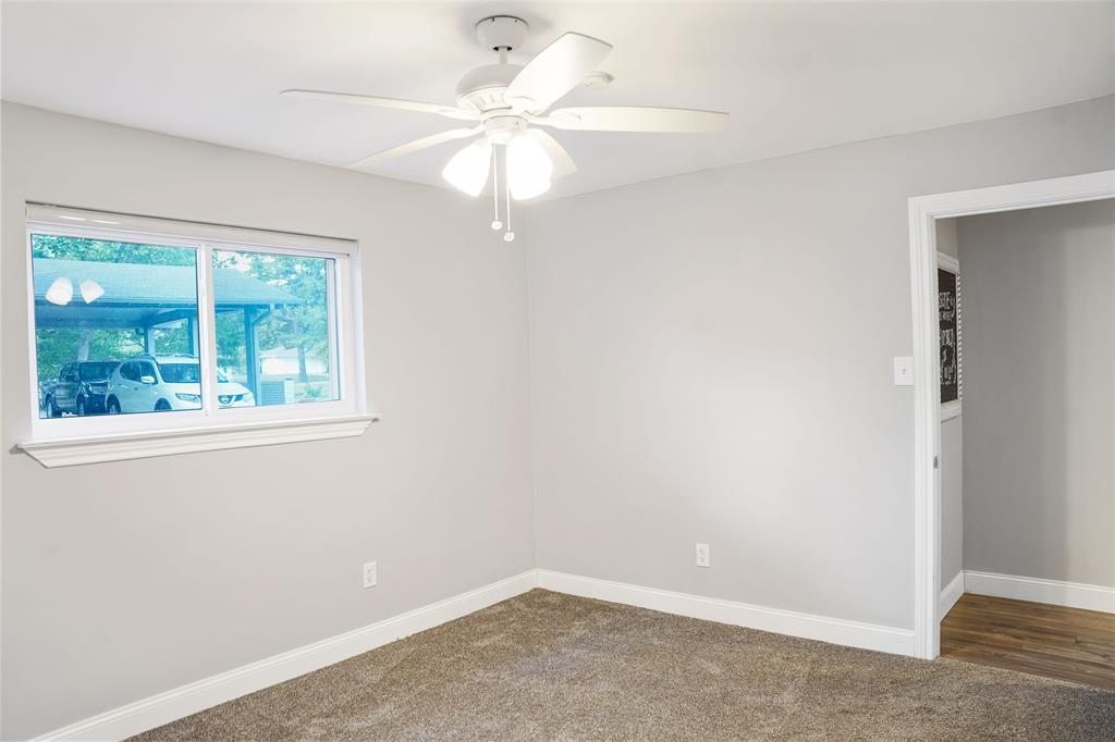 3011 Tanglewood Drive Commerce, TX 75428 - Photo 28 of 40 an empty room with a window