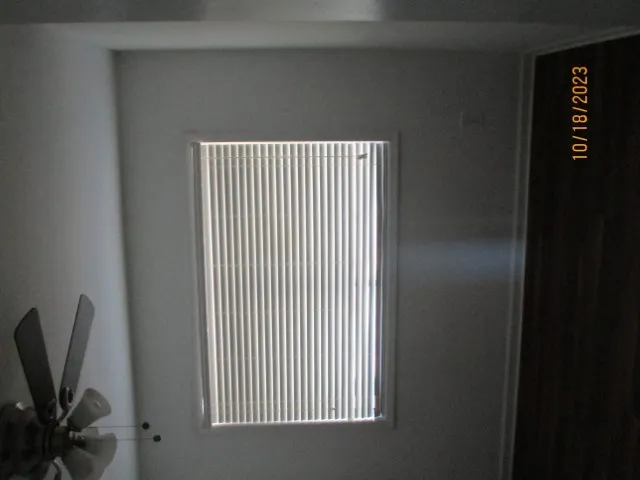 a view of a livingroom with a chair