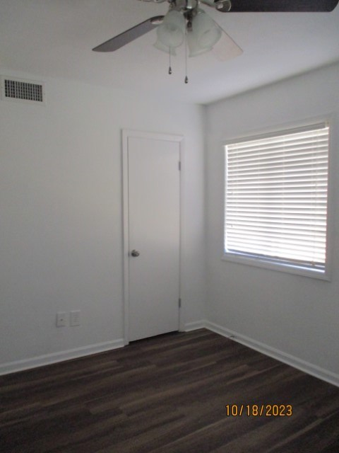 6120 Miller Road Columbus, GA 31907 - Photo 26 of 27 a view of an empty room with wooden floor and a window
