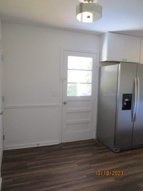 6120 Miller Road Columbus, GA 31907 - Photo 7 of 27 an empty room with wooden floor and window