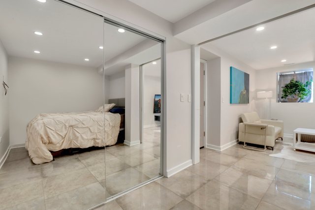 3604 West George Street, Unit G Chicago, IL 60618 - Photo 13 of 19 a bedroom with furniture and a couch