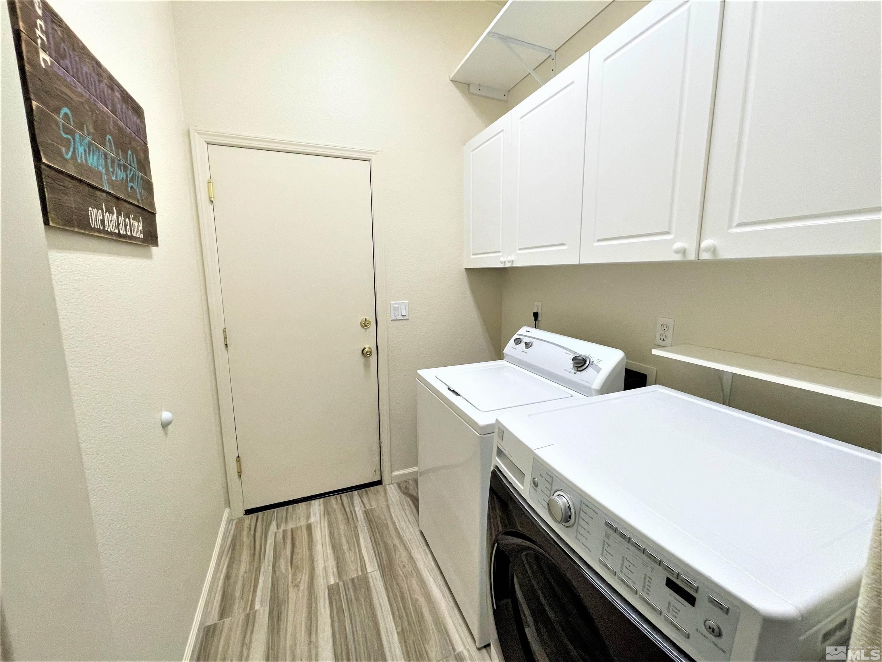 1710 Canyonlands Way Reno, NV 89521 - Photo 13 of 28 a utility room with dryer and washer