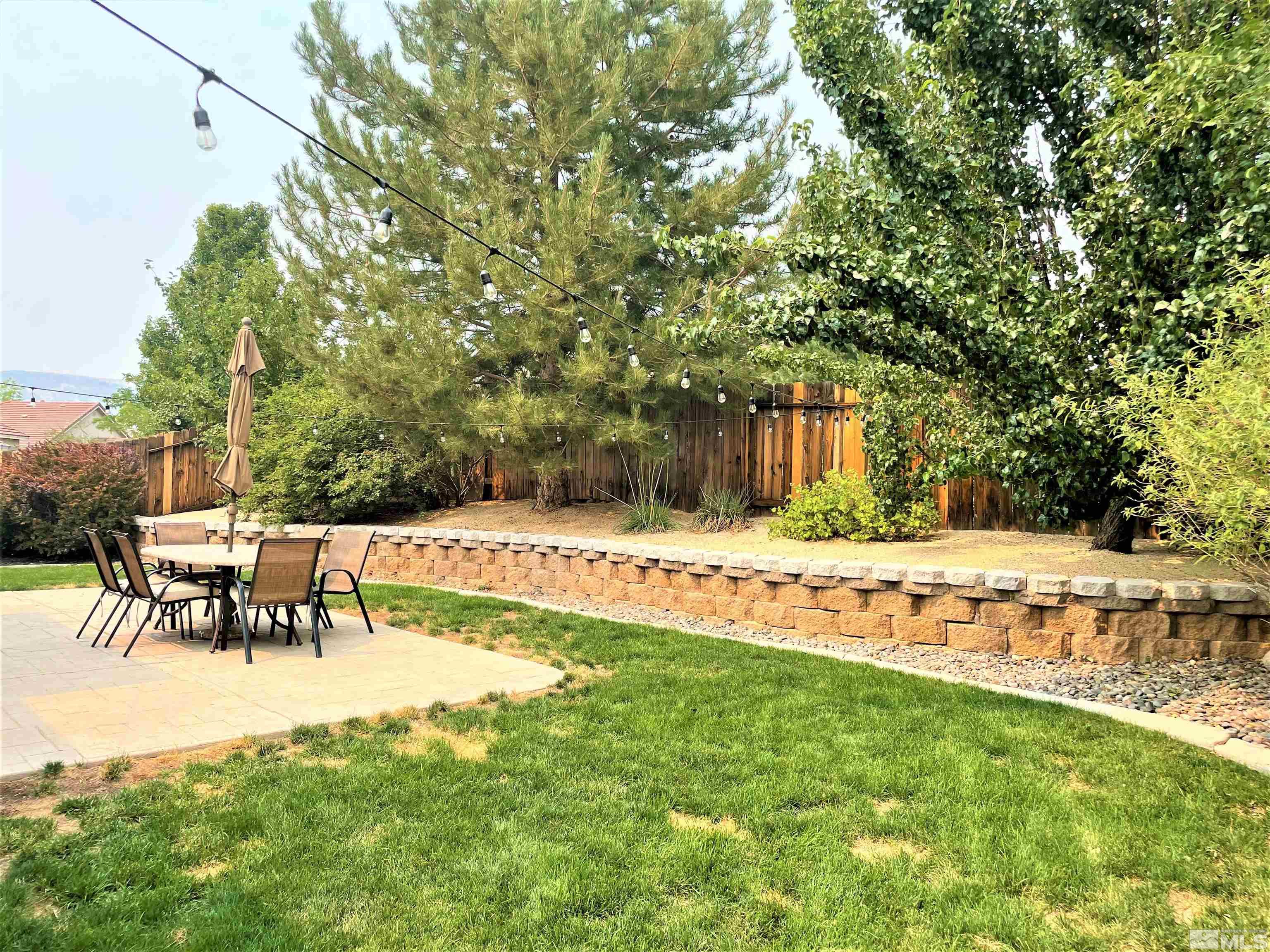 1710 Canyonlands Way Reno, NV 89521 - Photo 26 of 28 a view of a swimming pool with a patio