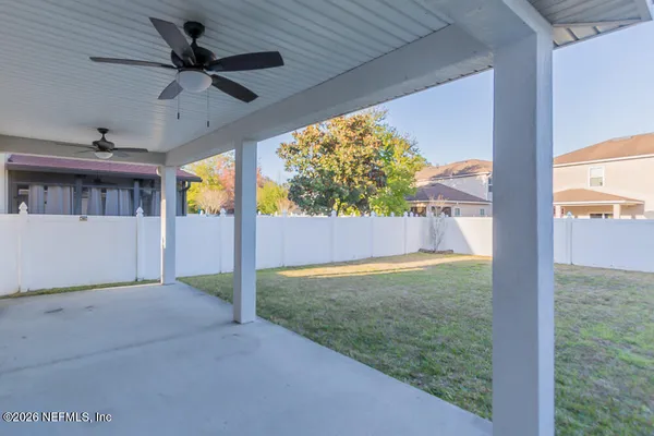 a view of backyard and porch