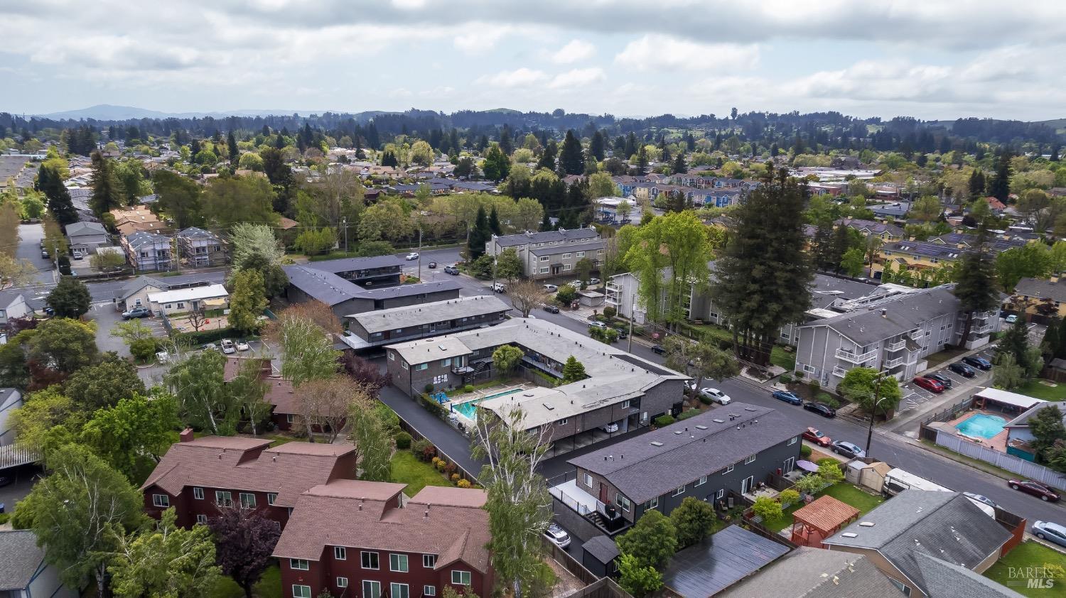 8020 Beverly Drive Rohnert Park, CA 94928 - Photo 19 of 35 an aerial view of a city with lots of residential buildings lake and ocean view