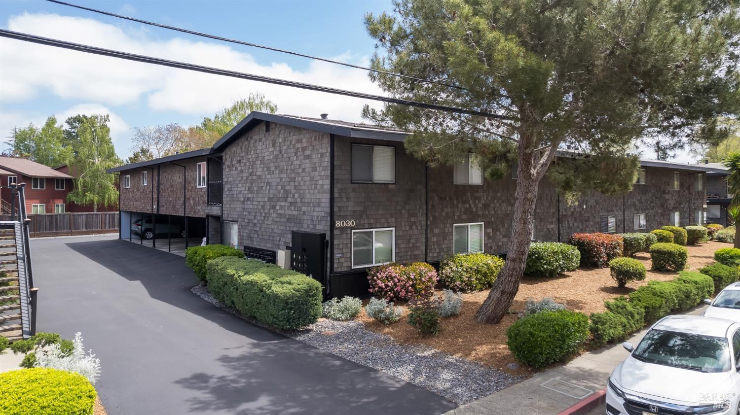 8020 Beverly Drive Rohnert Park, CA 94928 - Photo 2 of 35 a front view of a house with garden