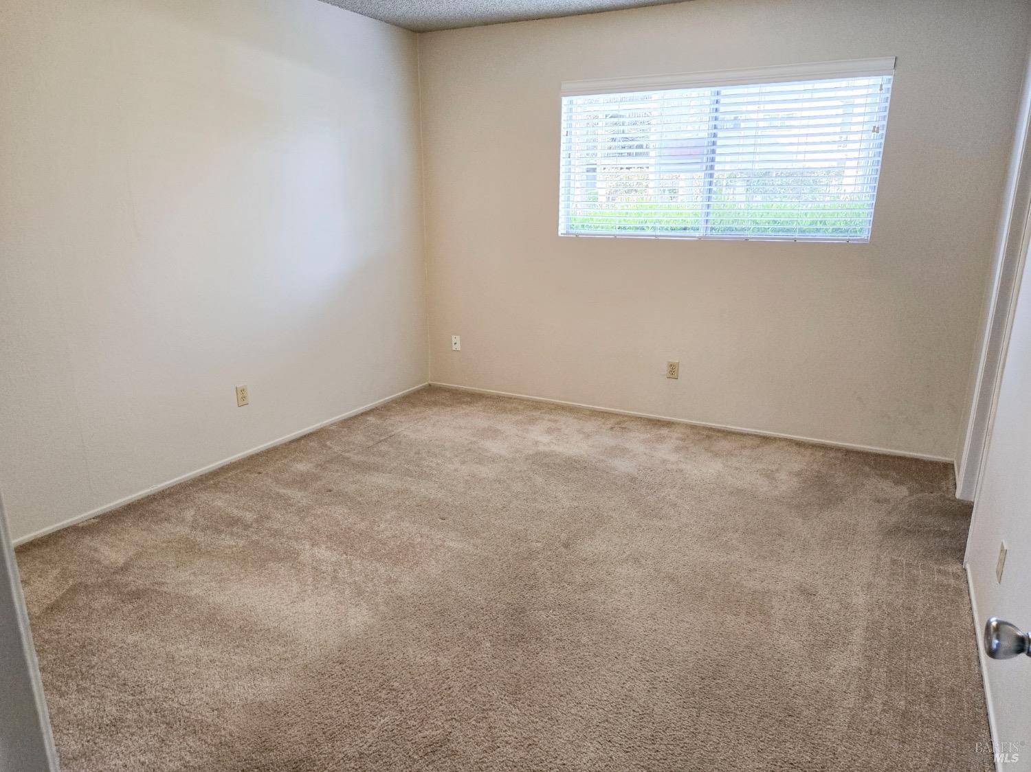 8020 Beverly Drive Rohnert Park, CA 94928 - Photo 31 of 35 an empty room with a window
