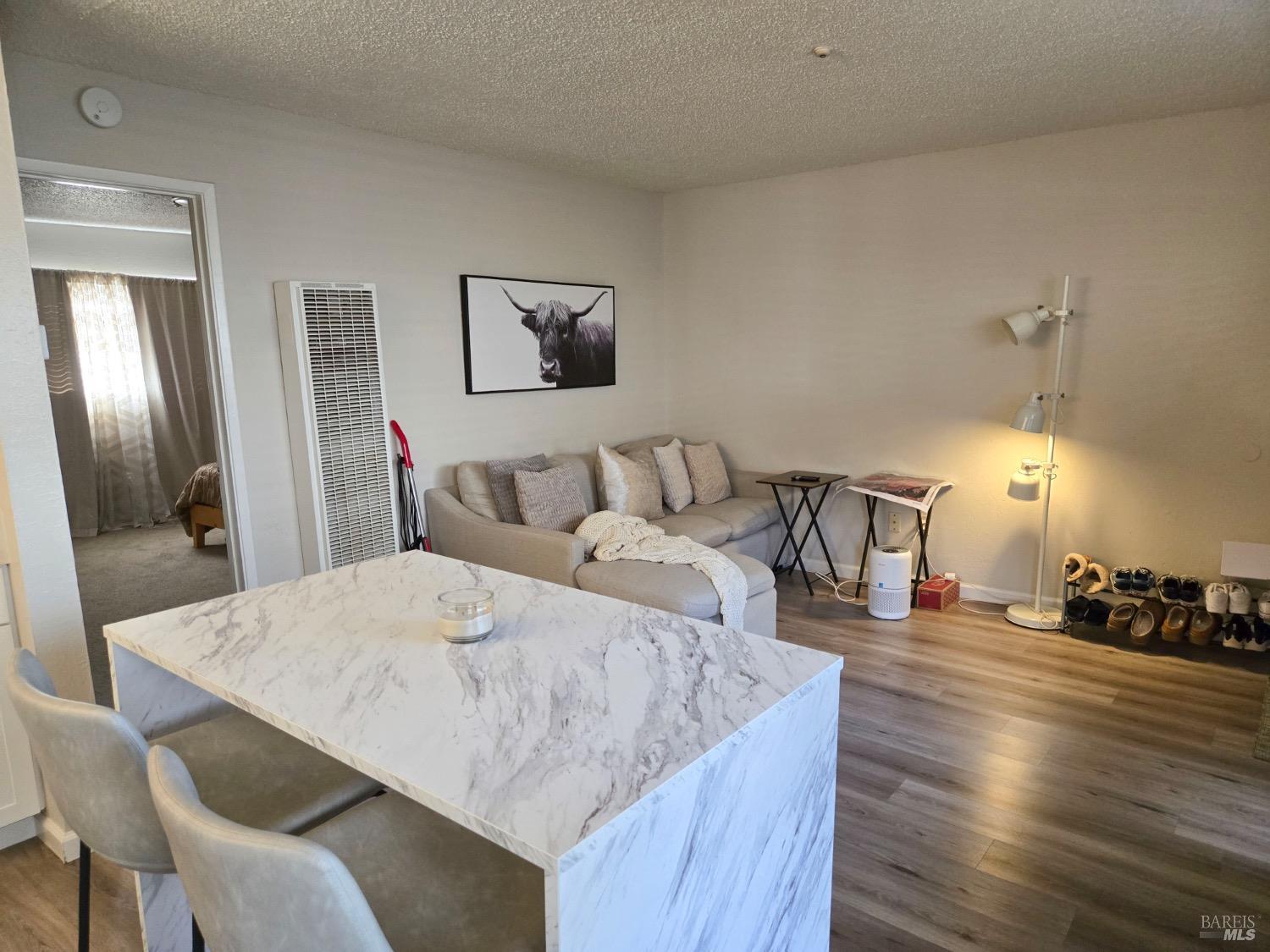 8020 Beverly Drive Rohnert Park, CA 94928 - Photo 33 of 35 a living room with furniture and wooden floor