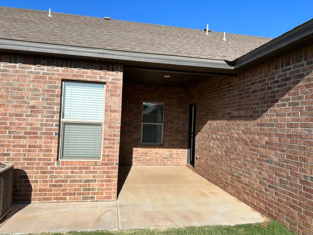 a view of a back yard of the house