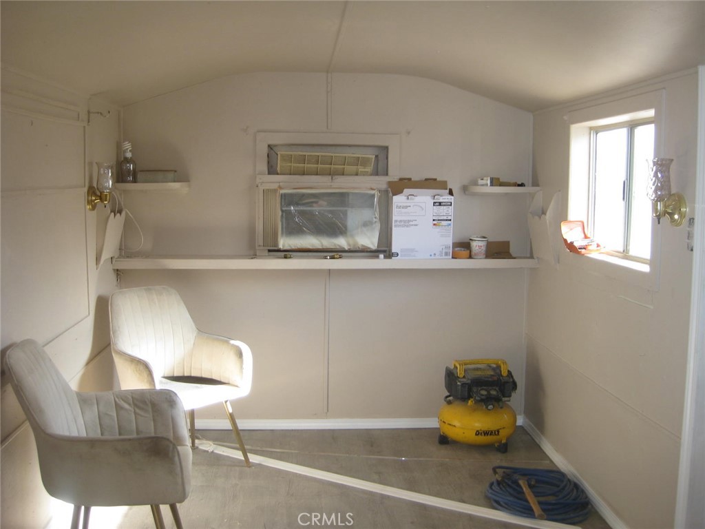 38937 Oleander Newberry Springs, Unit 2 Yermo, CA 92398 - Photo 4 of 10 a living room with furniture and a window