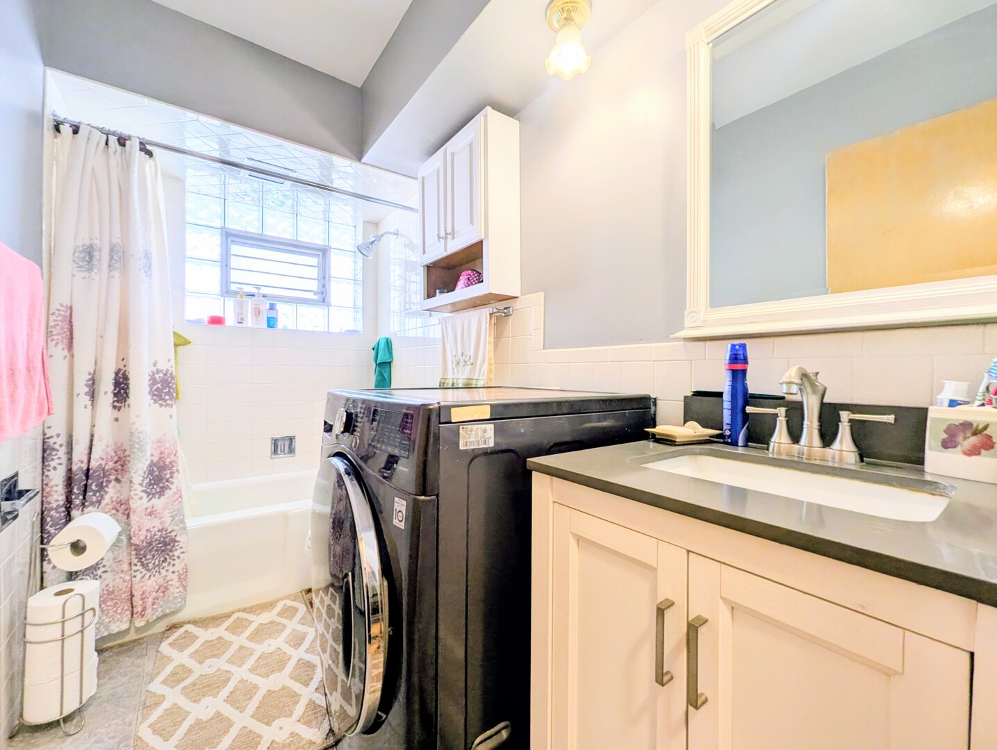 4229 North Keystone Avenue, Unit 3H Chicago, IL 60641 - Photo 19 of 22 a utility room with cabinets washer and dryer