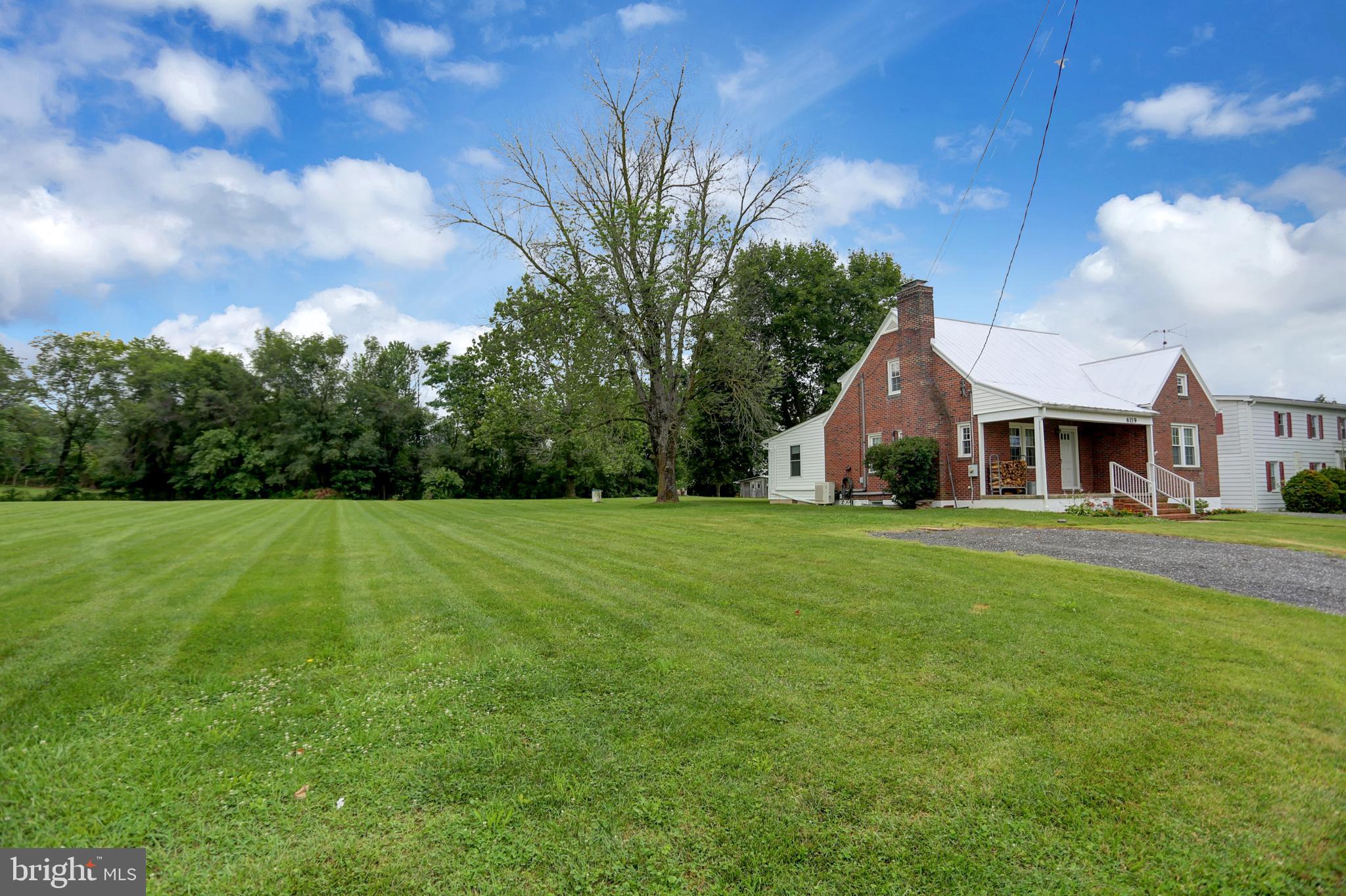 6119 Middleburg Road Keymar, MD 21757 - Photo 2 of 50 a front view of a house with garden