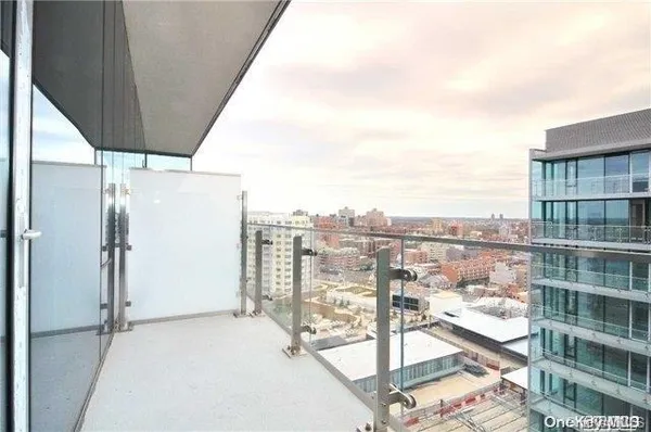 a view of a balcony with city view