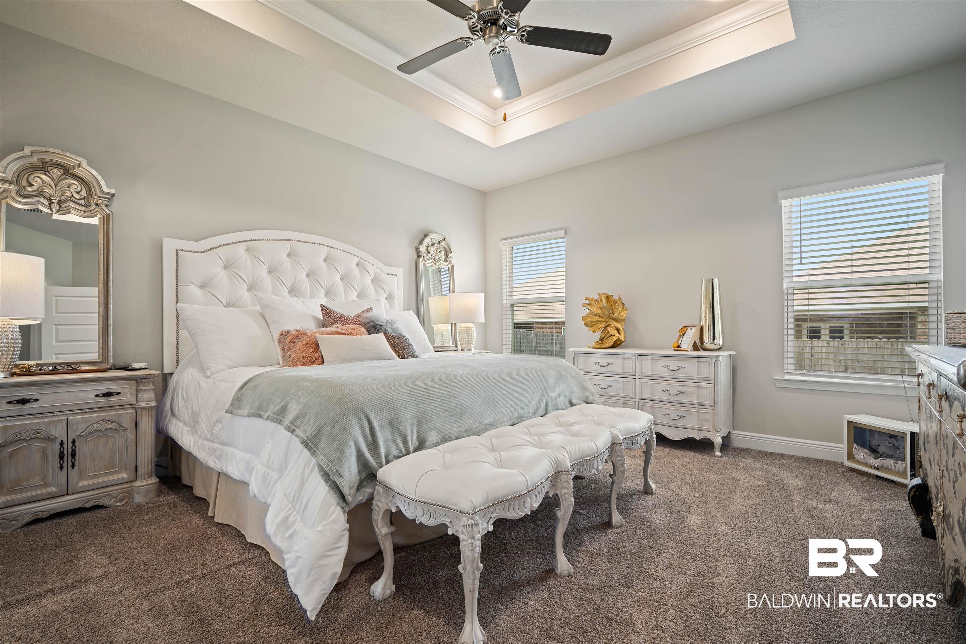 10474 Loamy Avenue Mobile, AL 36695 - Photo 13 of 31 Bedroom with a raised ceiling, multiple windows, dark colored carpet, crown molding, and ceiling fan