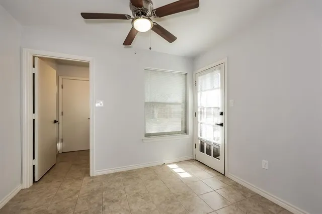 a kitchen with a sink a stove a counter space and cabinets