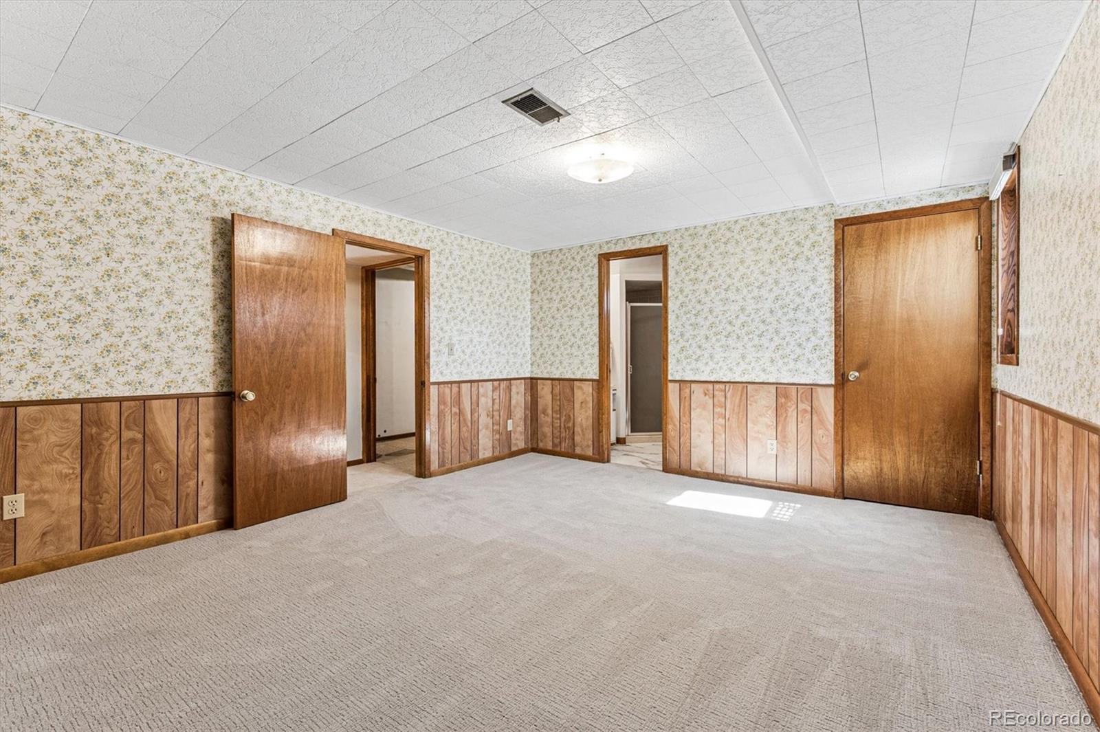 6505 West 34th Avenue Wheat Ridge, CO 80033 - Photo 18 of 28 a view of entryway with stairs