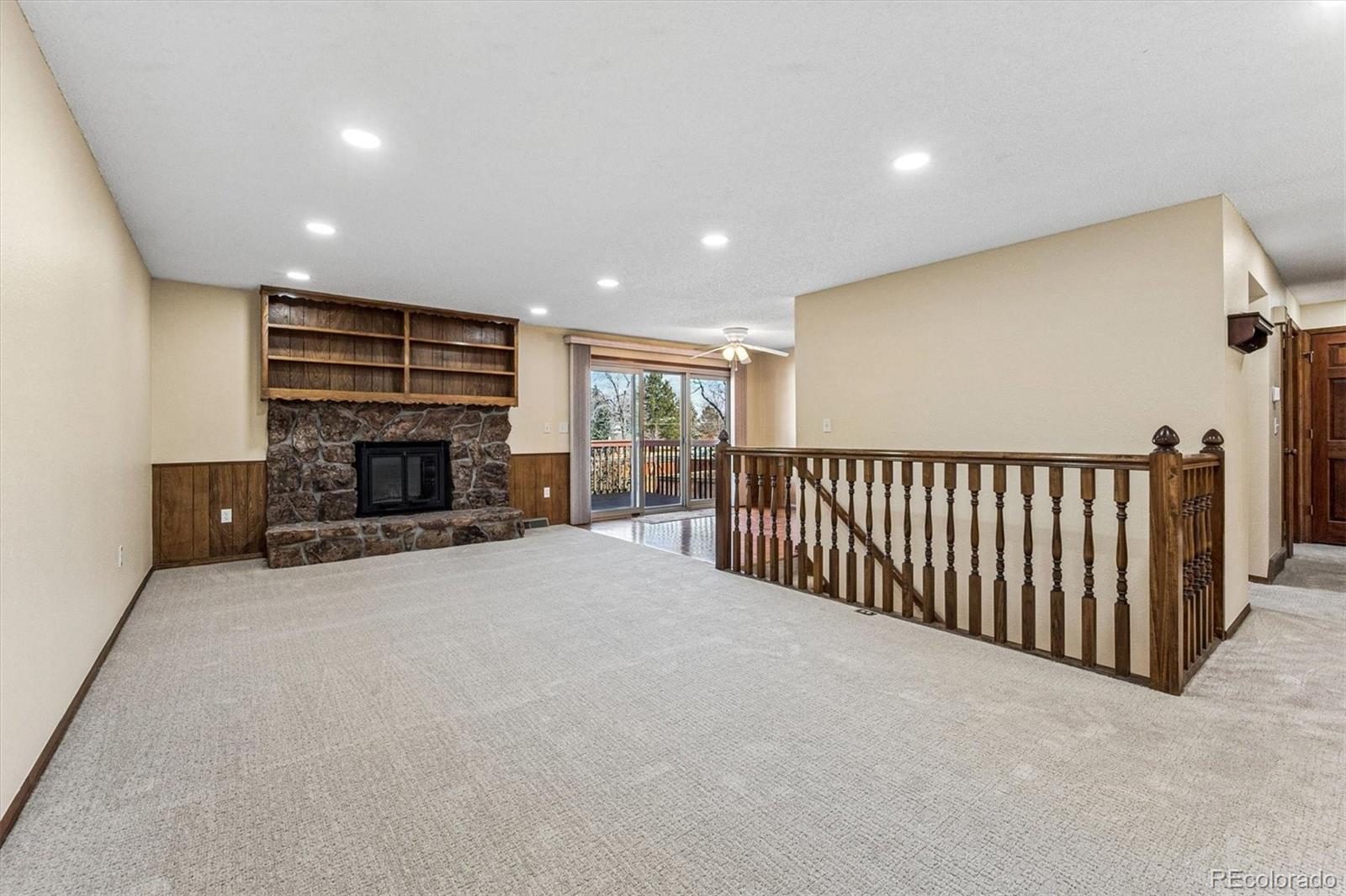 6505 West 34th Avenue Wheat Ridge, CO 80033 - Photo 6 of 28 a view of a livingroom with a fireplace