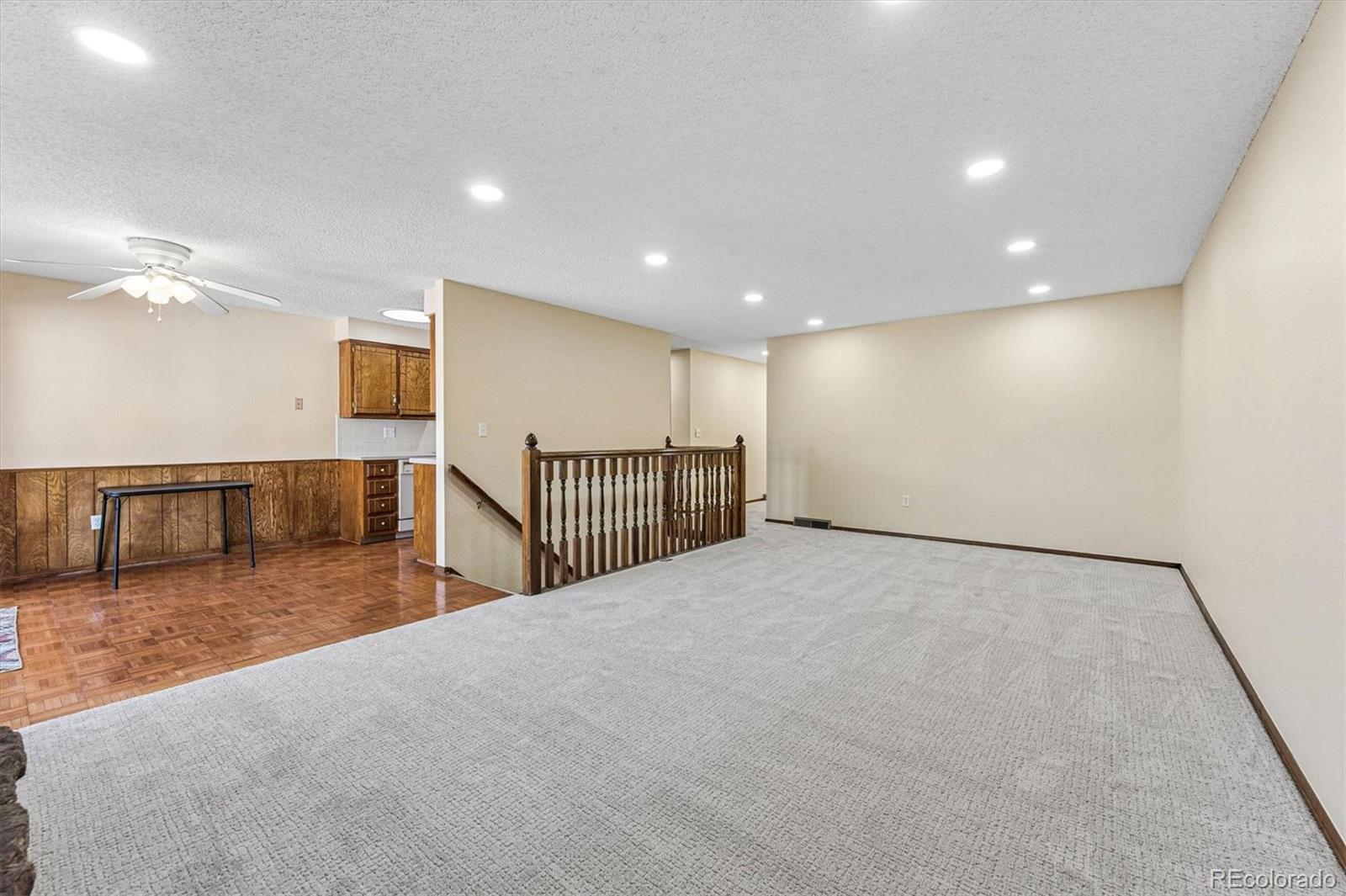 6505 West 34th Avenue Wheat Ridge, CO 80033 - Photo 7 of 28 a view of an empty room
