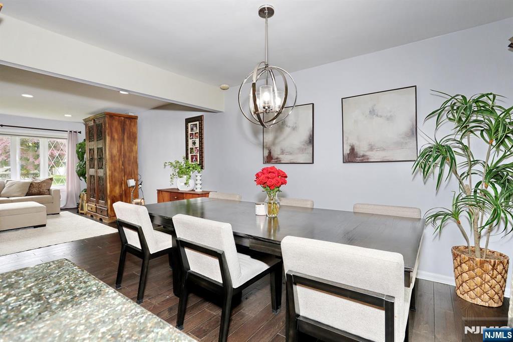 30 Brookfield Road Dumont, NJ 07628 - Photo 10 of 50 a view of a dining room with furniture wooden floor and a chandelier