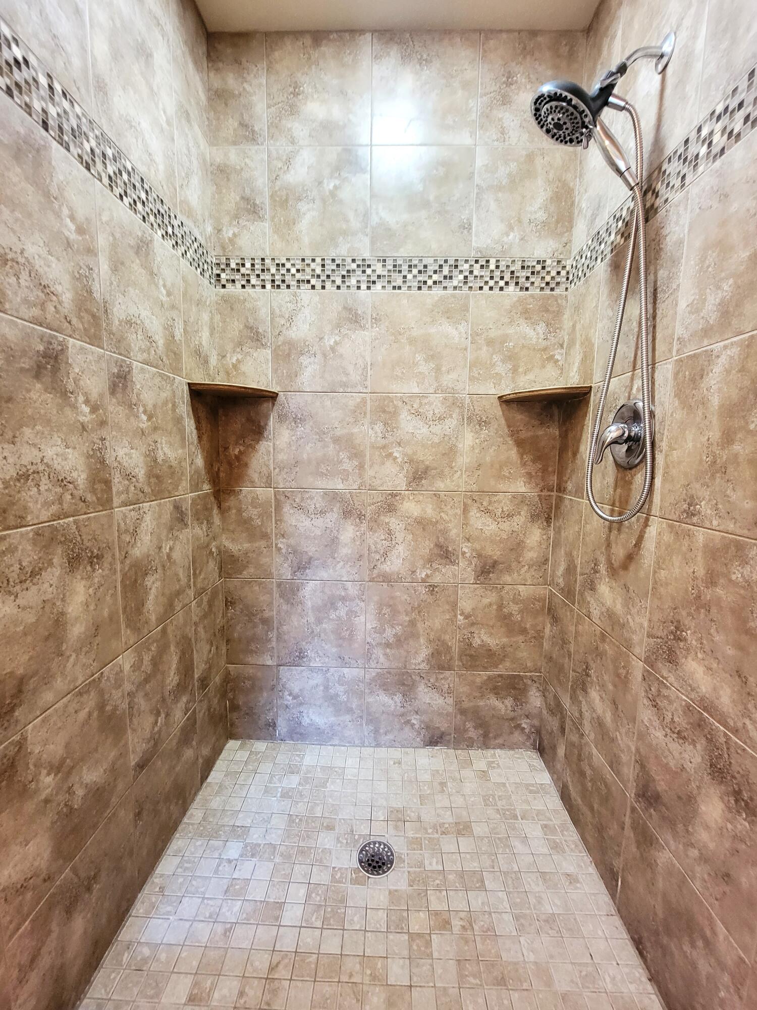 505 Vale Loop Crestview, FL 32536 - Photo 12 of 14 a bathroom with a shower