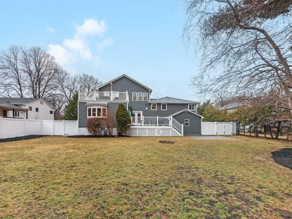 128 Olde Field Road Newton, MA 02459 - Photo 4 of 36 a front view of a house with a yard