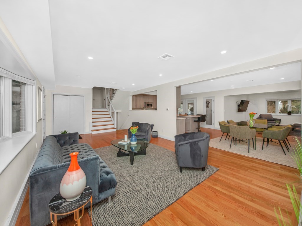 128 Olde Field Road Newton, MA 02459 - Photo 6 of 36 a living room with furniture and wooden floor