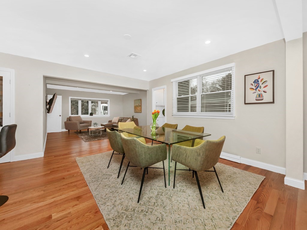 128 Olde Field Road Newton, MA 02459 - Photo 9 of 36 a living room with furniture a wooden floor and next to a window