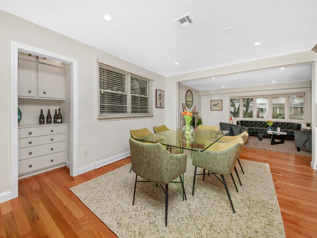 128 Olde Field Road Newton, MA 02459 - Photo 10 of 36 a living room with furniture and wooden floor