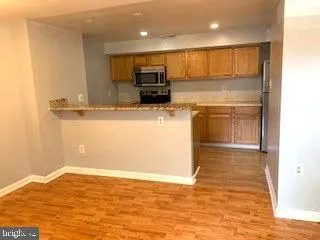 a view of a kitchen with a sink