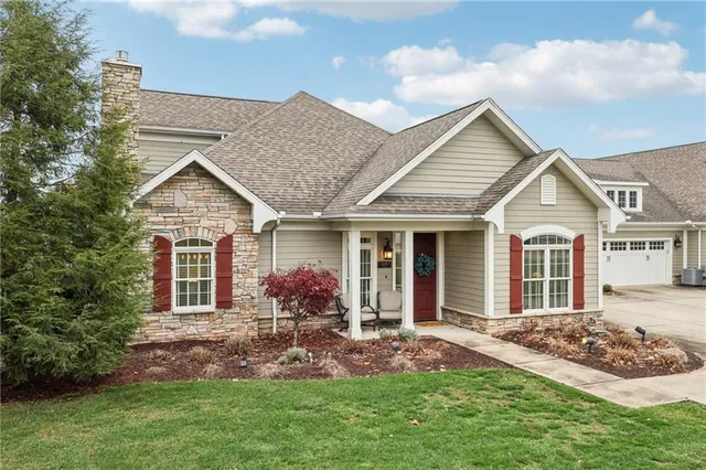 front view of a house and a yard