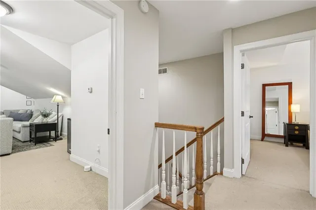 a view of a livingroom and a livingroom with furniture