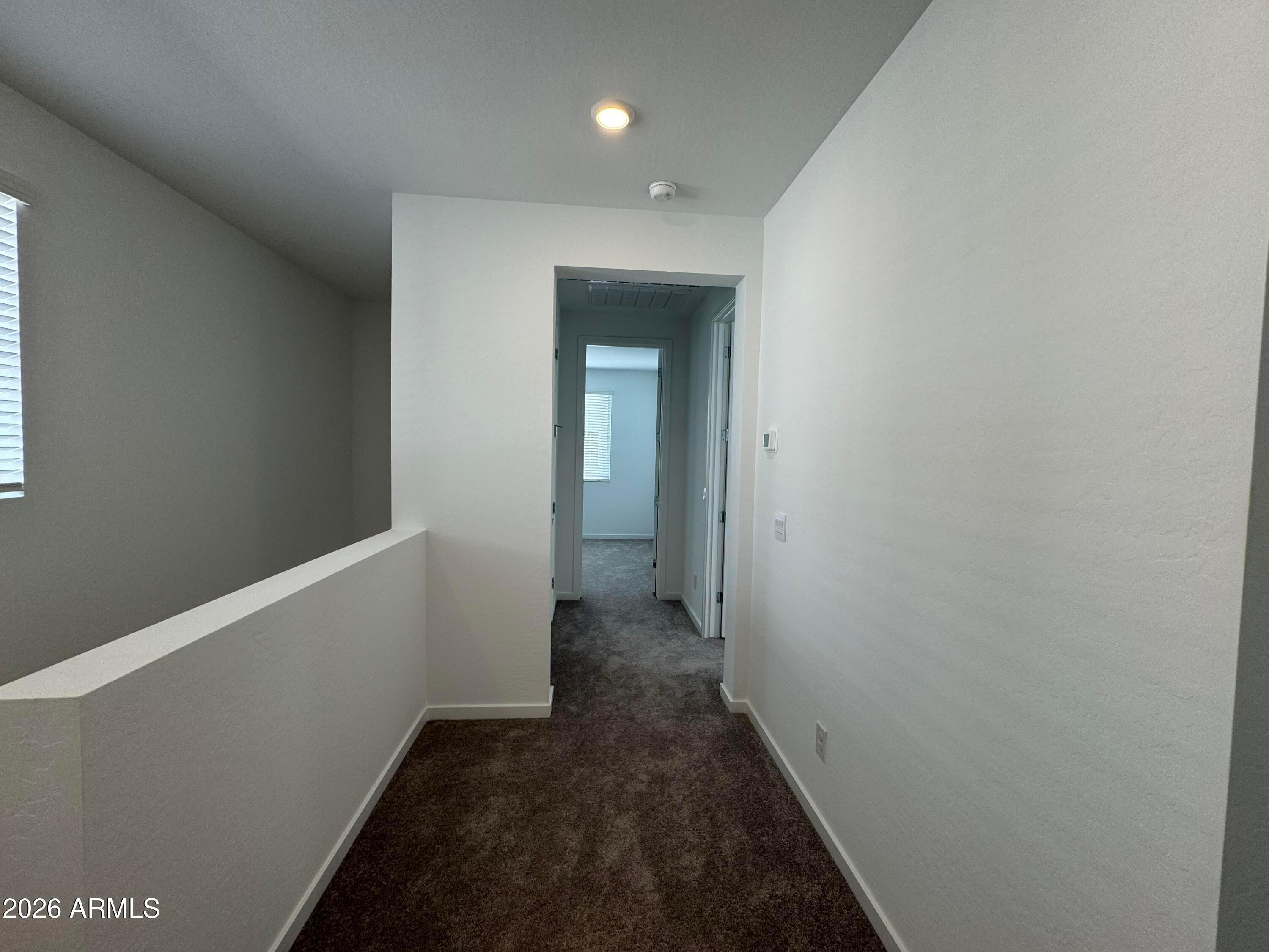 2438 West Rowel Road Phoenix, AZ 85085 - Photo 14 of 30 a view of hallway with closet