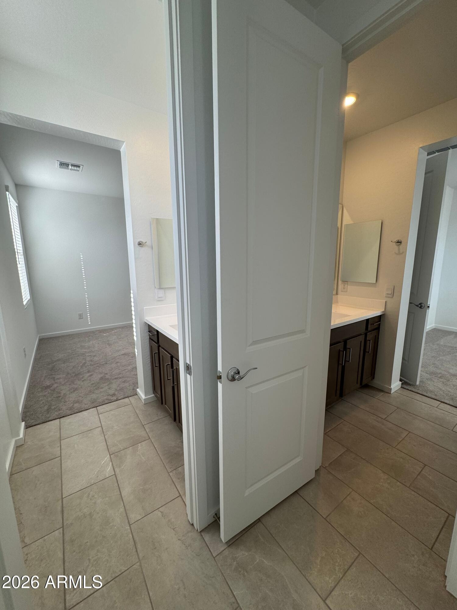 2438 West Rowel Road Phoenix, AZ 85085 - Photo 26 of 30 a view of a hallway to rooms