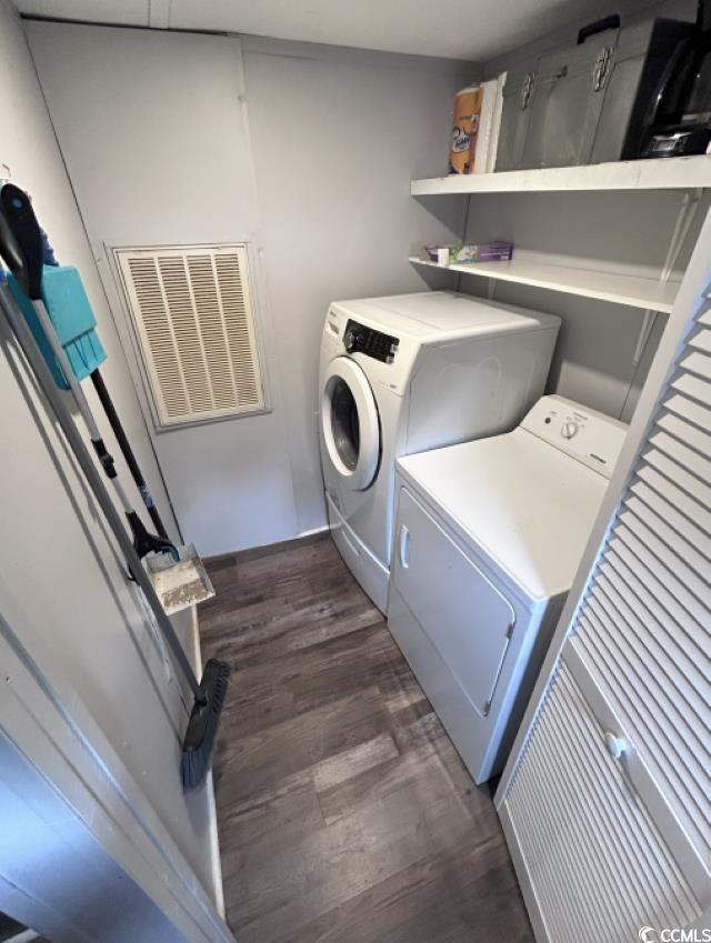 356 Calhoun Drive Murrells Inlet, SC 29576 - Photo 11 of 26 Laundry room with washer and dryer and dark wood-type flooring