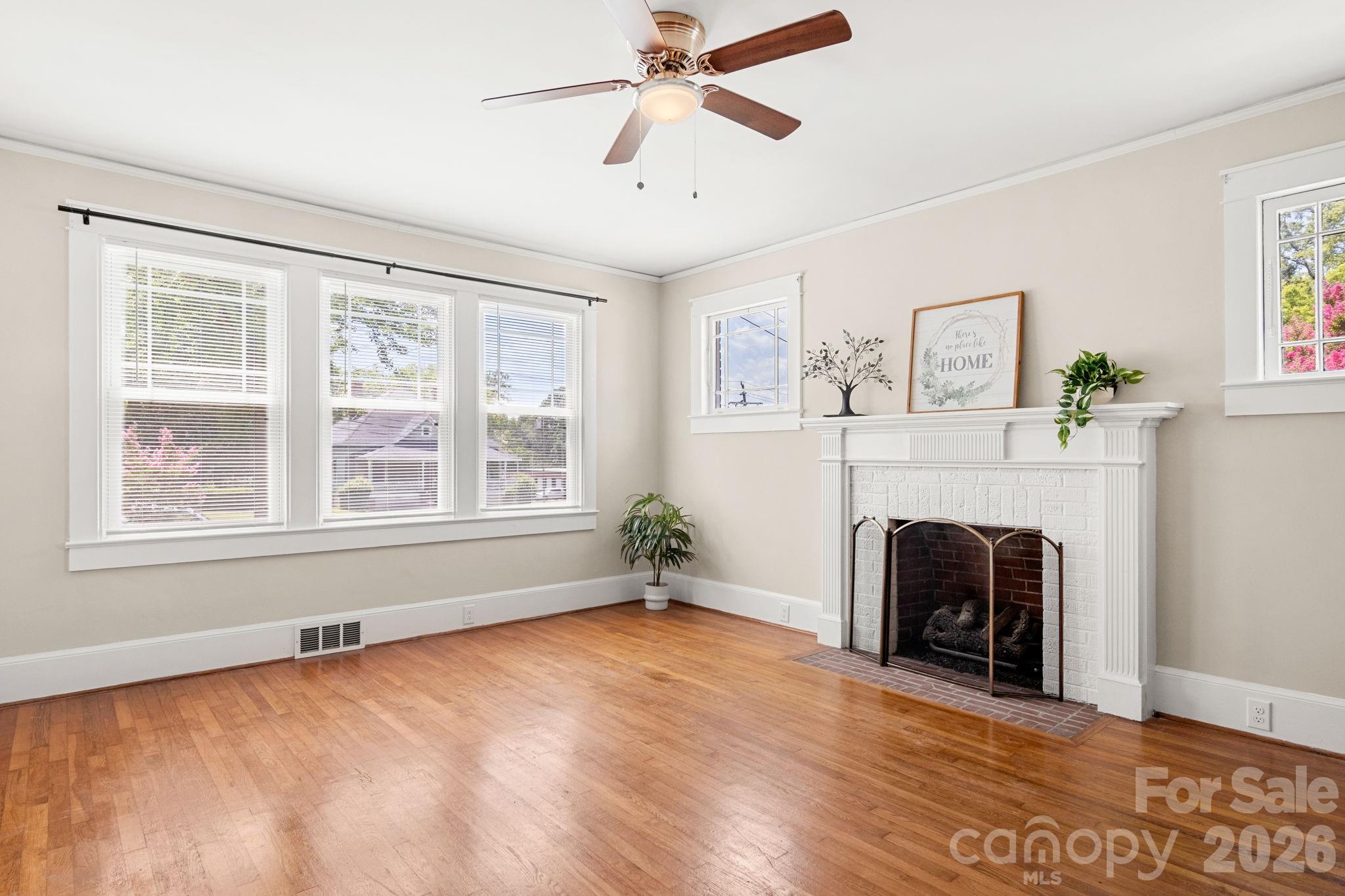 108 Reedy Street Chester, SC 29706 - Photo 5 of 42 a living room with furniture and a fireplace