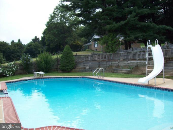 1910 Springhill Lane Hampstead, MD 21074 - Photo 11 of 20 Pool with sliding board