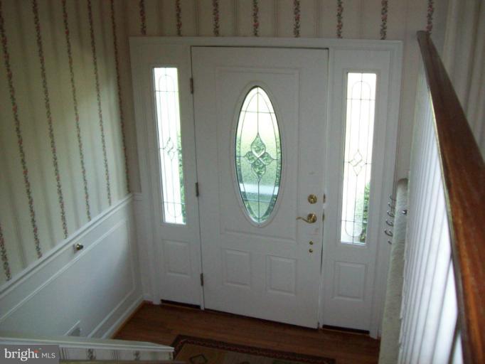 1910 Springhill Lane Hampstead, MD 21074 - Photo 4 of 20 foyer open to Living rm