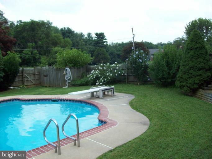 1910 Springhill Lane Hampstead, MD 21074 - Photo 5 of 20 fenced back yard with pool