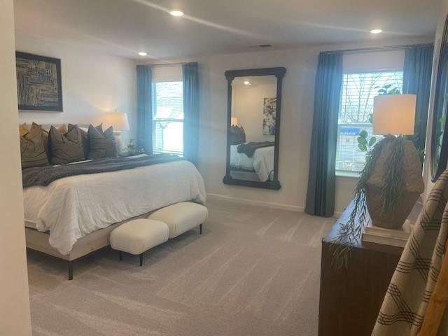 155 Star Court Pendergrass, GA 30567 - Photo 13 of 34 a bedroom with a bed and window