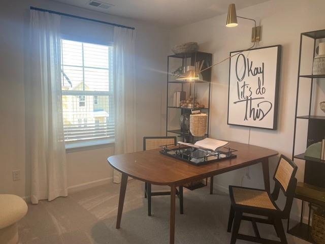155 Star Court Pendergrass, GA 30567 - Photo 23 of 34 a view of a dining room with furniture and window
