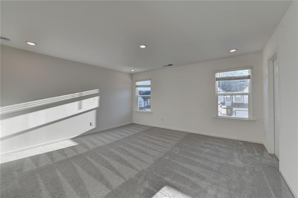 155 Star Court Pendergrass, GA 30567 - Photo 27 of 34 an empty room with windows