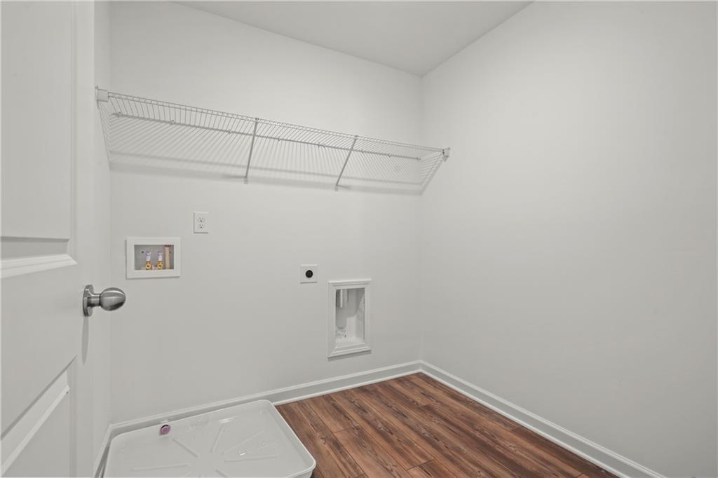 155 Star Court Pendergrass, GA 30567 - Photo 28 of 34 a view of a room with racks on the wall