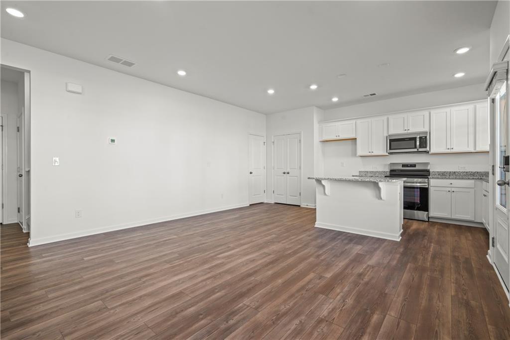 155 Star Court Pendergrass, GA 30567 - Photo 10 of 34 a view of kitchen with wooden floor