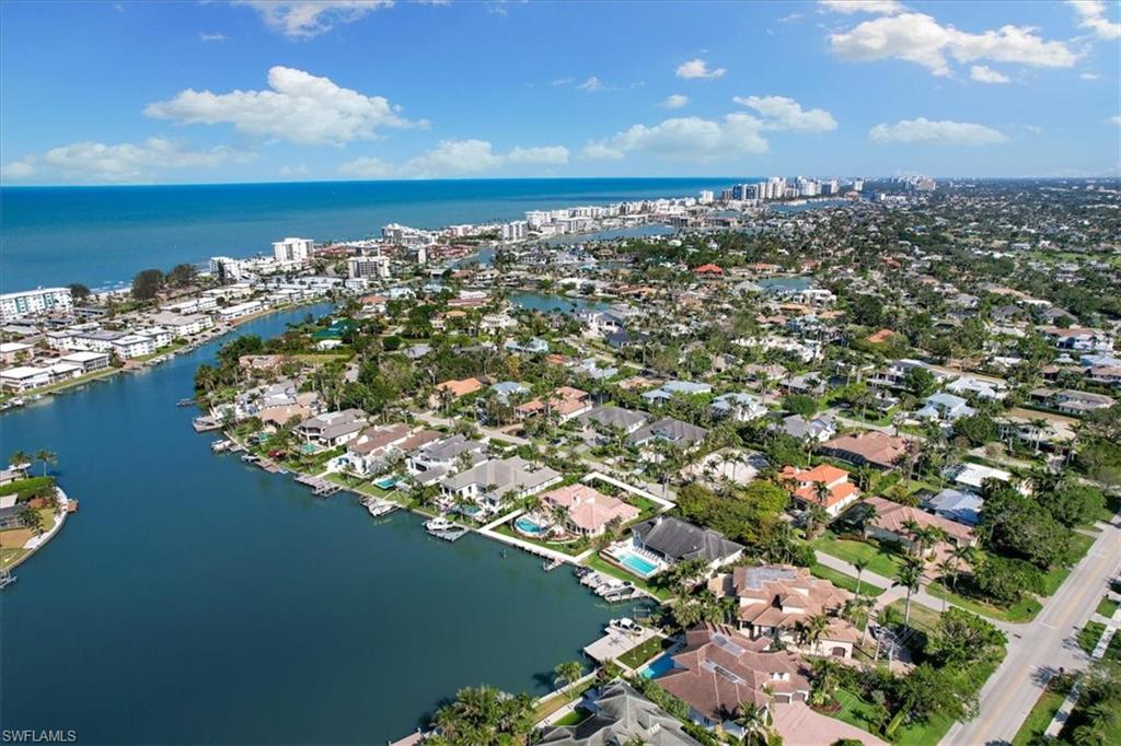 400 Springline Drive Naples, FL 34102 - Photo 6 of 32 an aerial view of a city